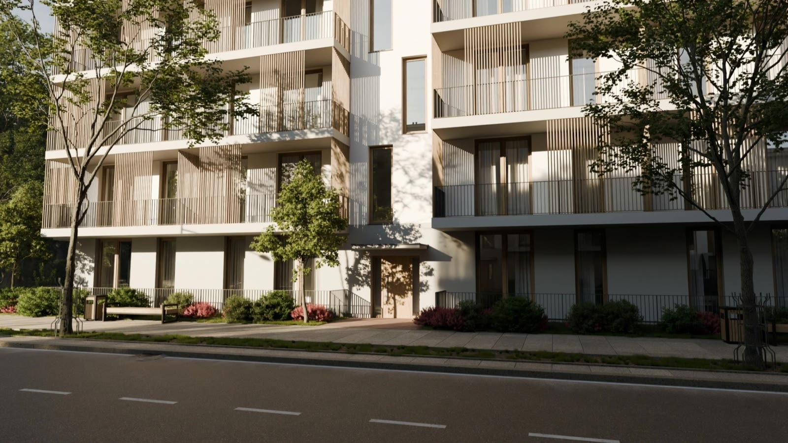 The north facade of Building A on a tree-lined street, with the wooden front door at the centre